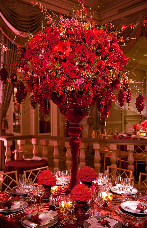 Tall floral centerpieces on a luxury reception table
