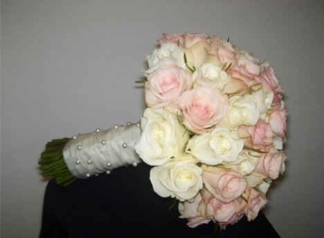 Romantic bridal bouquet of white and blush flowers