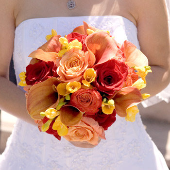 Lush floral arrangement of roses and seasonal blooms